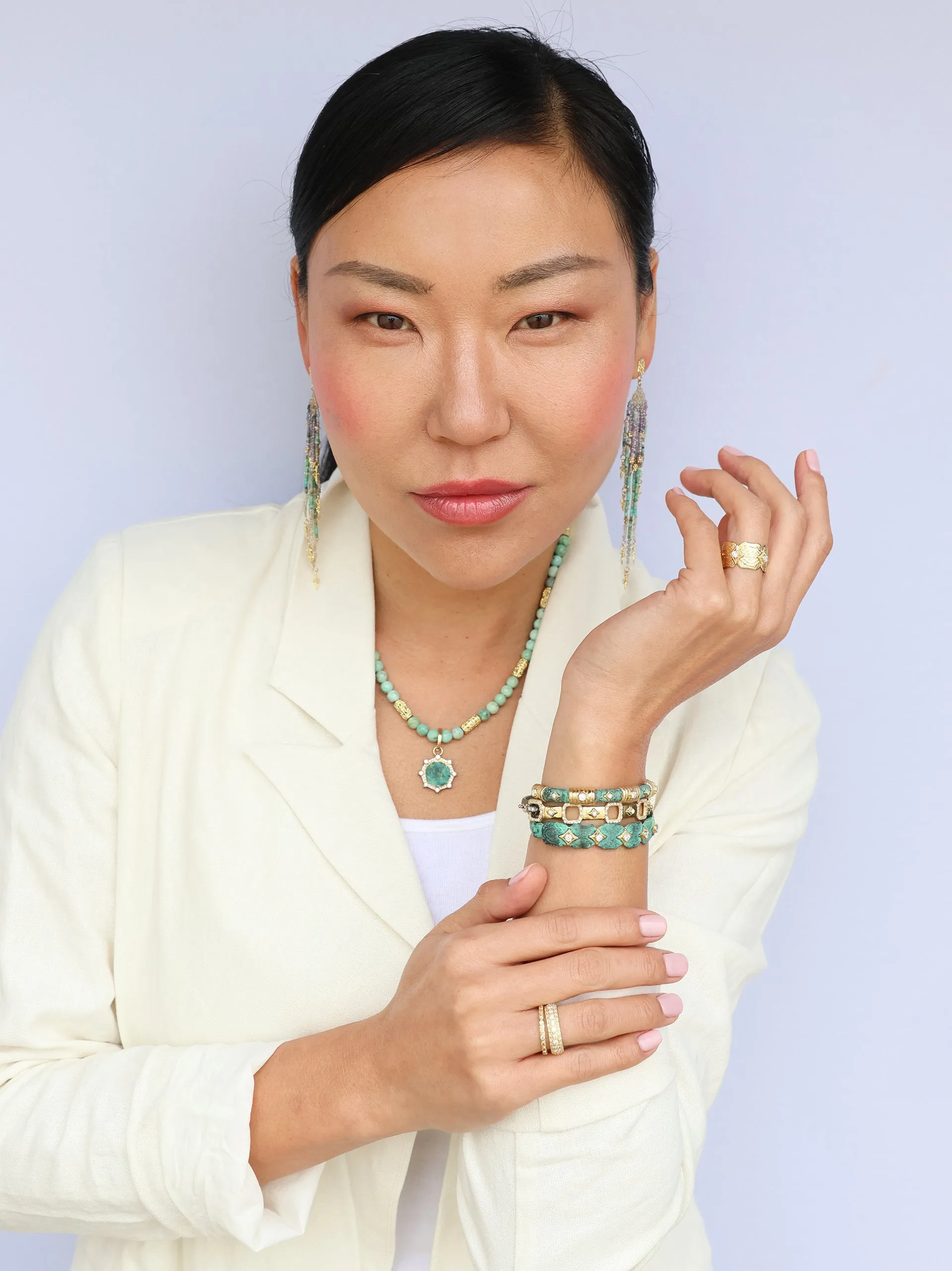 BEADED FEATHER EARRINGS