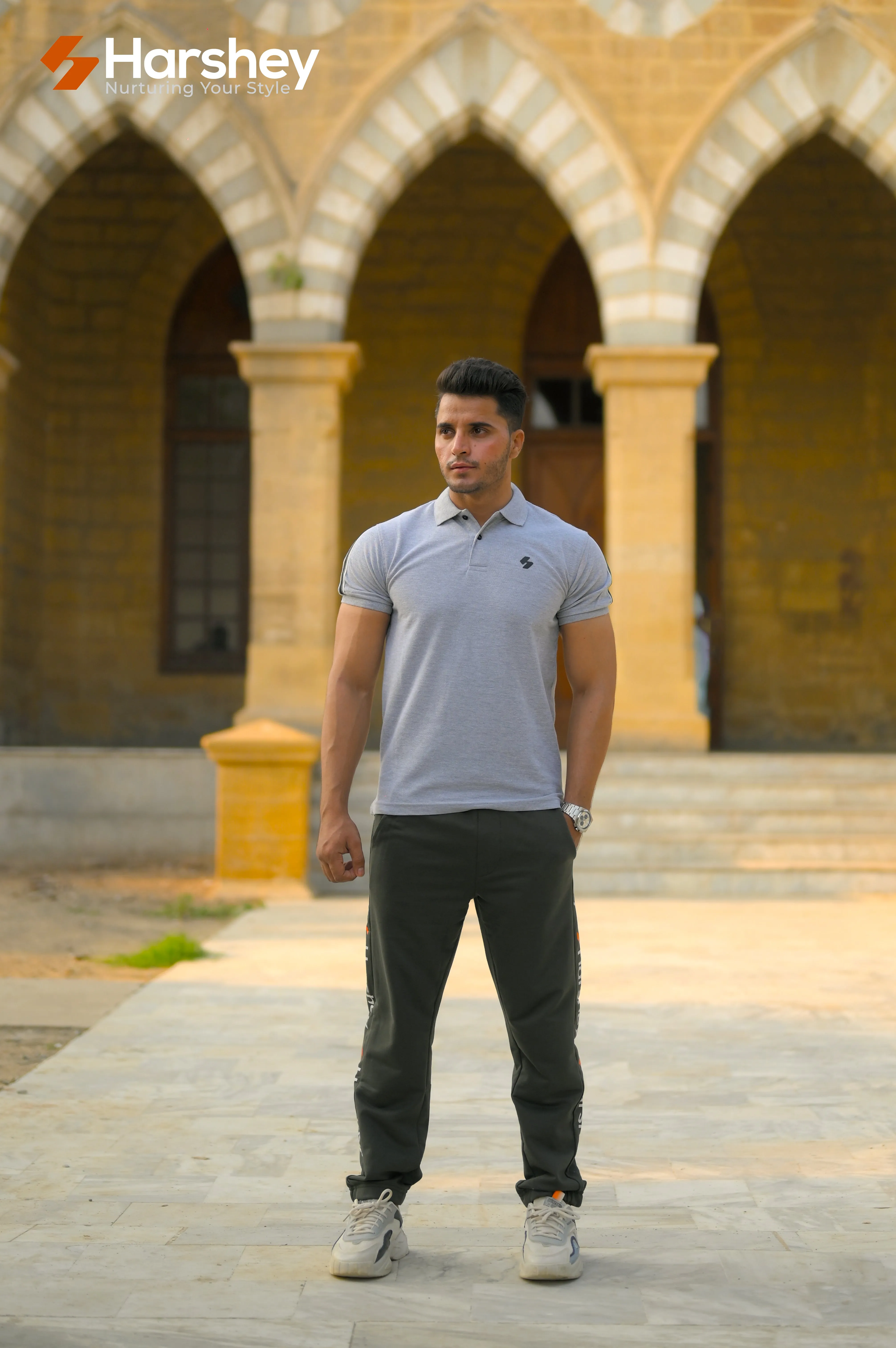 Classic Grey Polo with Black Stripes on Sleeves