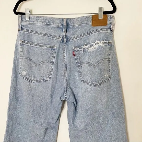 Levis women Baggy Dad Jeans Bin Day 29x30 vtg 90s light wash distressed