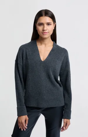 Soft sweater with deep V-neck and subtle rib details